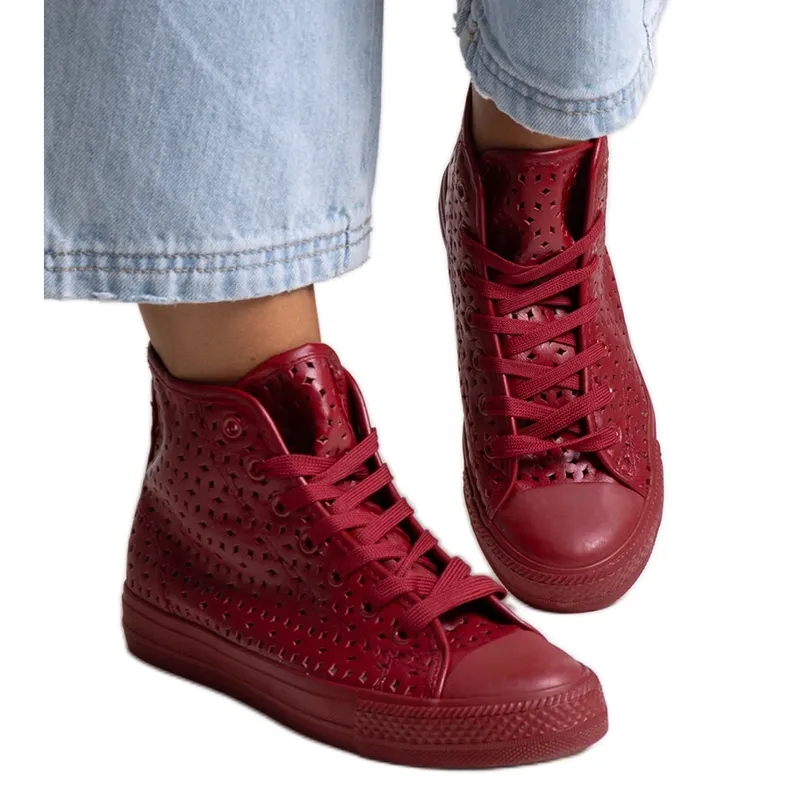 Red high-top openwork sneakers by Madala