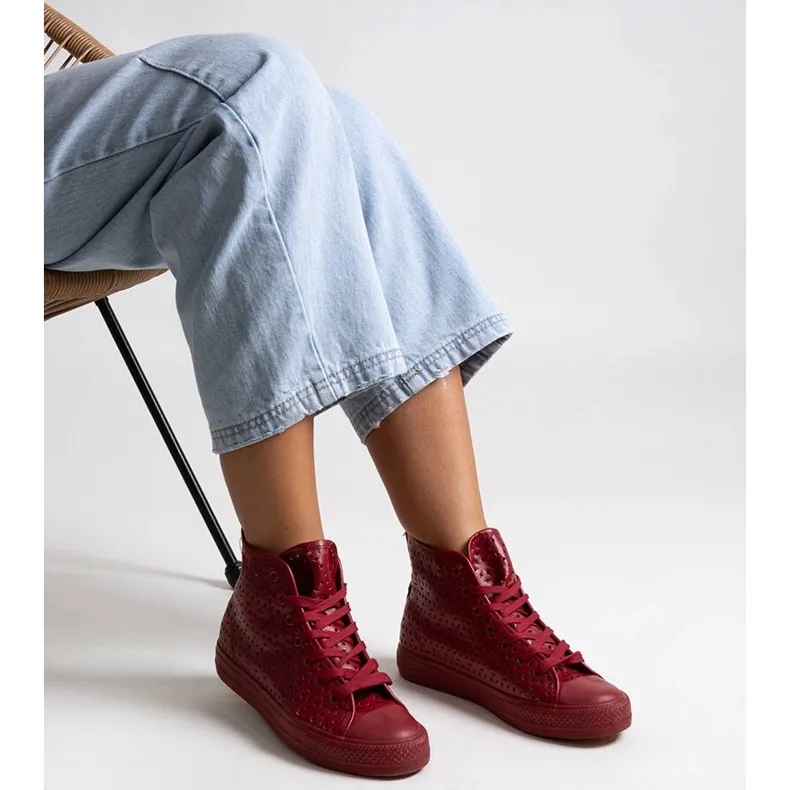 Red high-top openwork sneakers by Madala